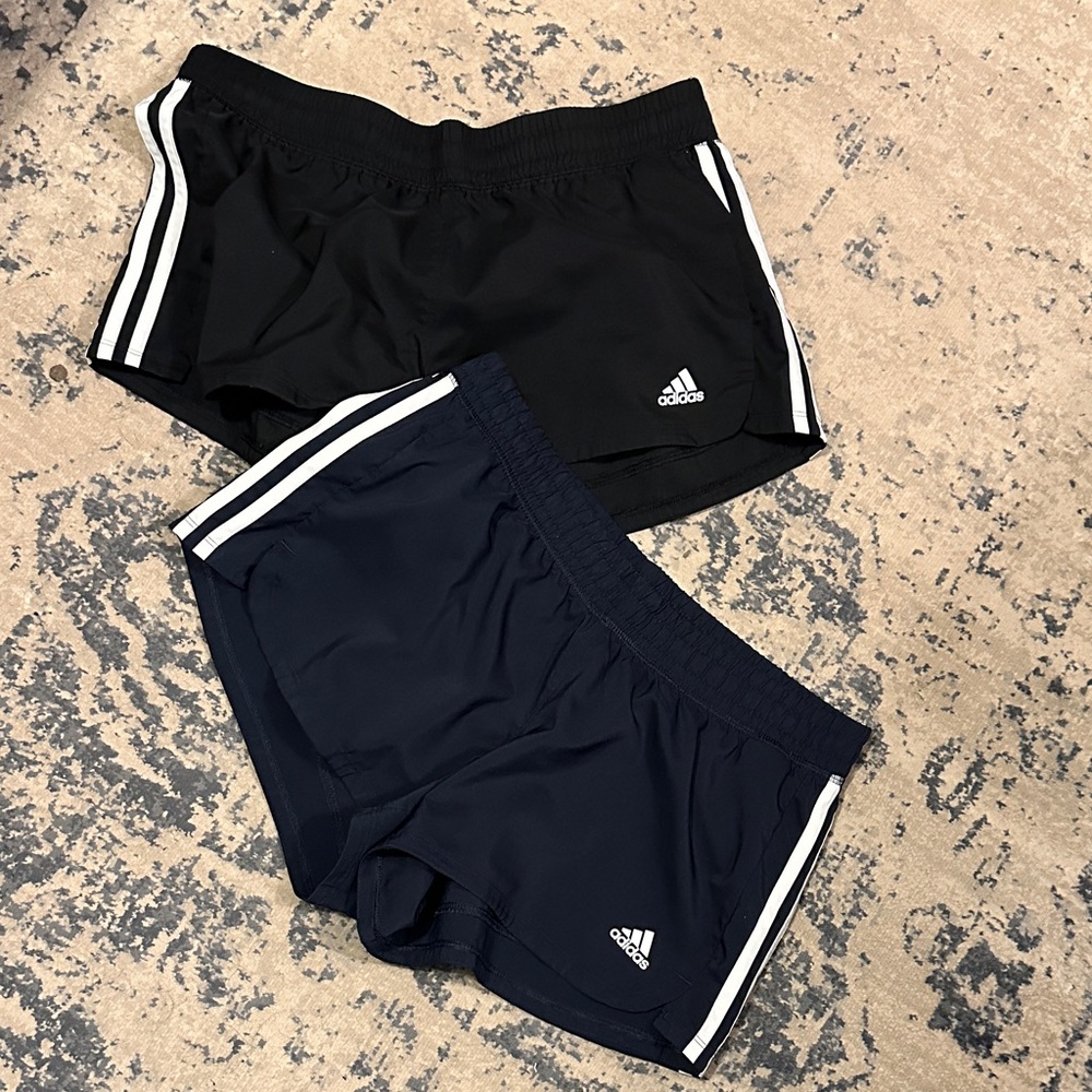Pair of adidas striped shorts navy & black